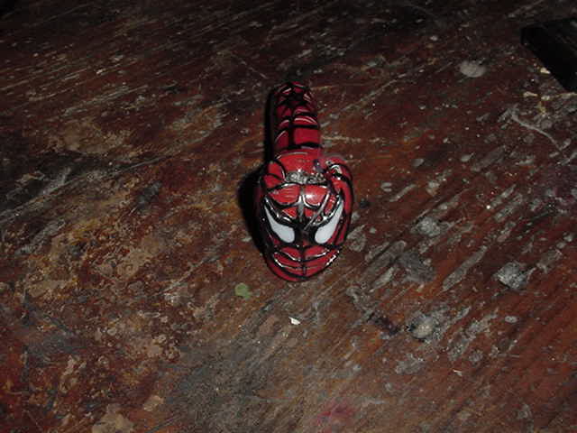 This is Tracy's Spiderman pipe.  Its a one of a kind.  I tried to get him to make me one, but he wants to have the only one.  This picture of it does not do it justice.