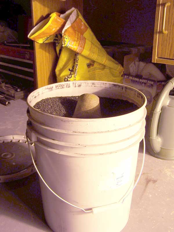 this is the bucket of activated carbon i bought off ebay.  it works pretty good so far. but i have to keep it sealed really well to prevent it from absorbing and getting old.