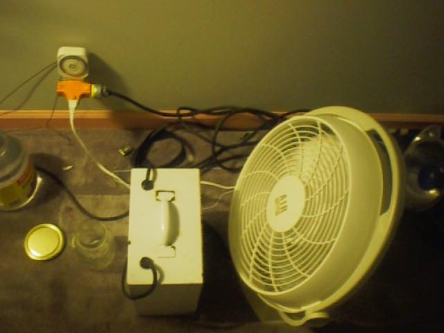 One purpose of the fan is to provide circulation, the other is to keep the ballast cool.