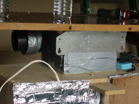 The 50 cfm exhaust fan for both rooms.